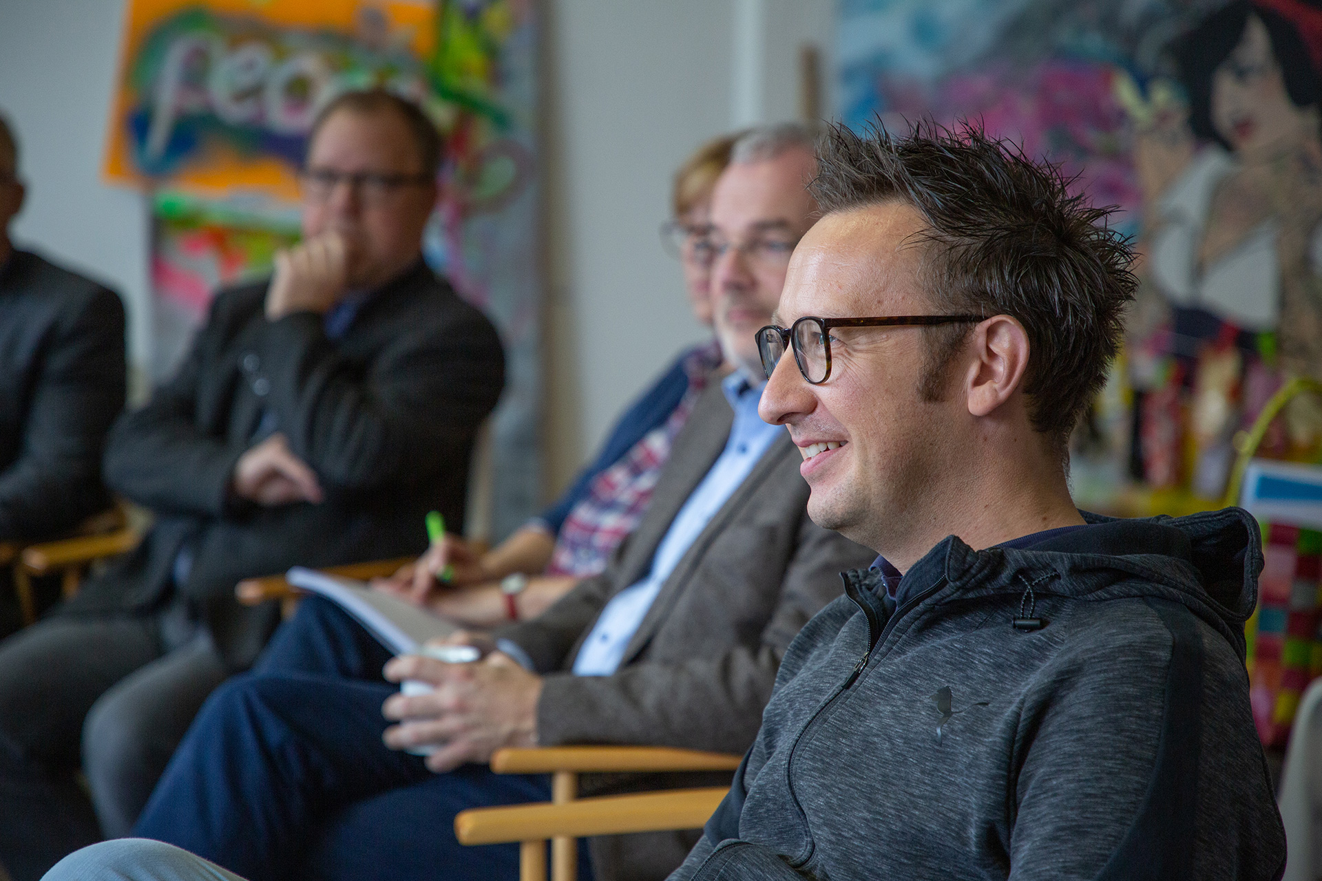 Philipp Klietz spricht bei einem Event – AV22 steht für respektvollen Umgang mit Kunden und im Team